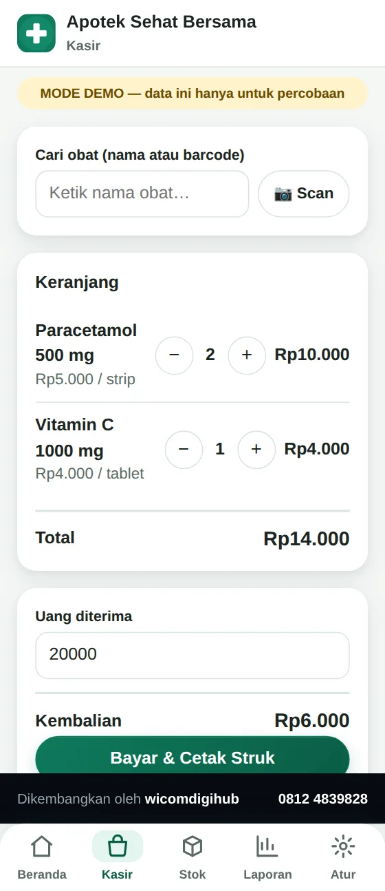 Layar Kasir: cari obat atau scan barcode, keranjang dua obat, total dan kembalian